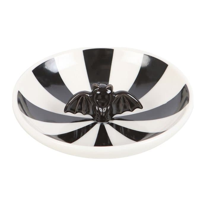 Black and white striped trinket dish with a bat