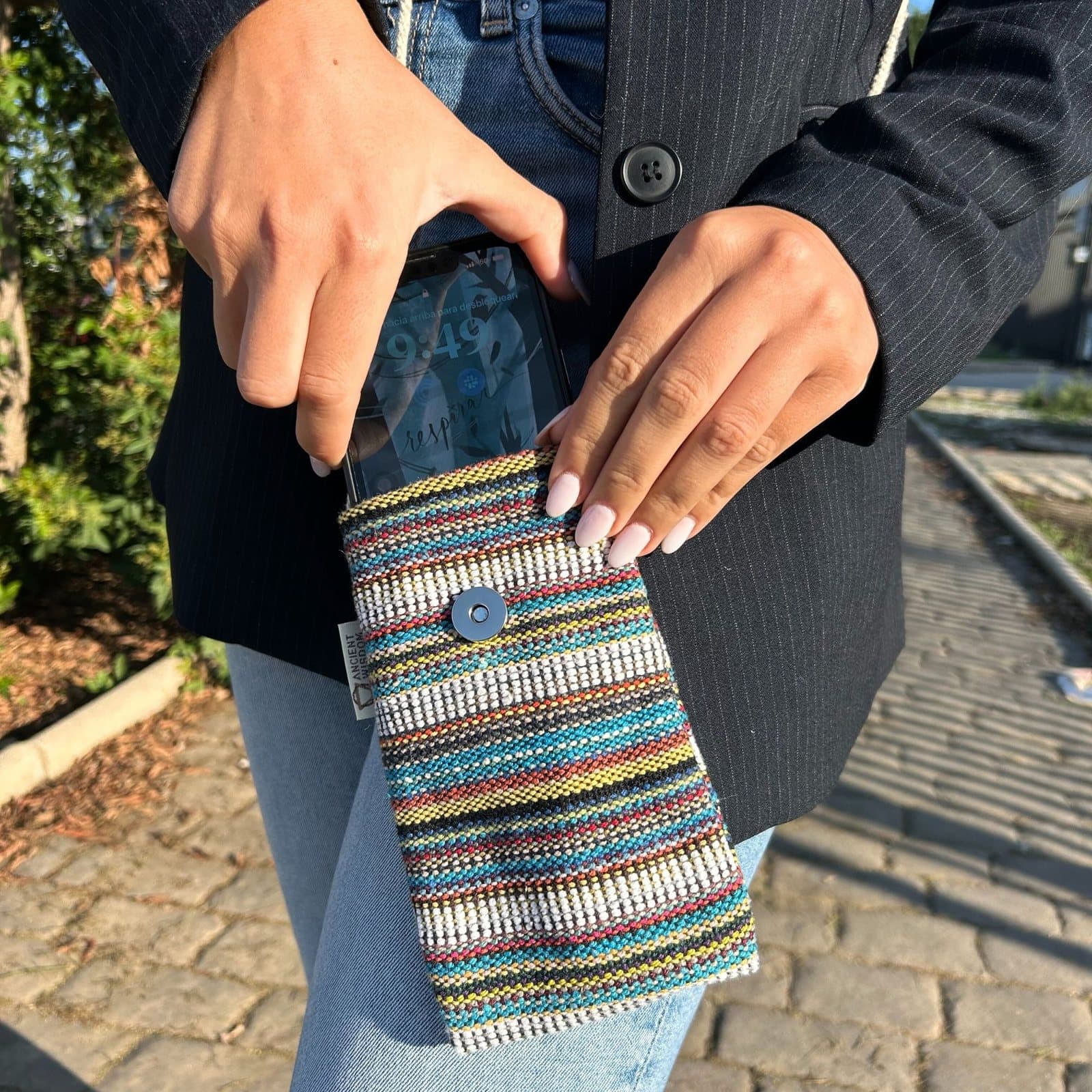 Striped phone bag with an owl