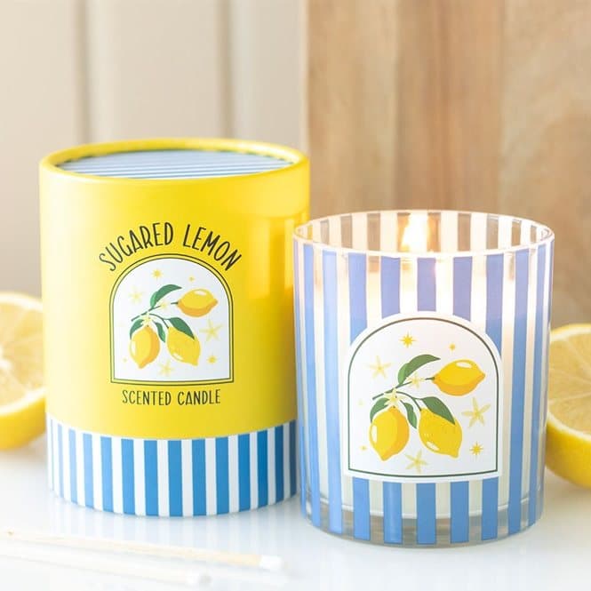Sugared lemon candle in a striped blue glass jar
