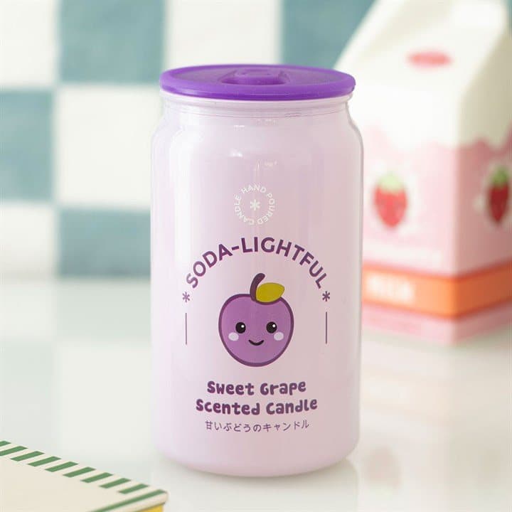 Sweet grape candle shaped like a purple soda can with a kawaii grape