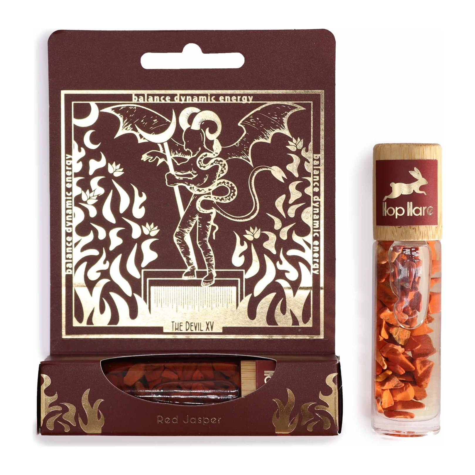 Essential oil roll-on named The Devil, with a red jasper gemstone inside