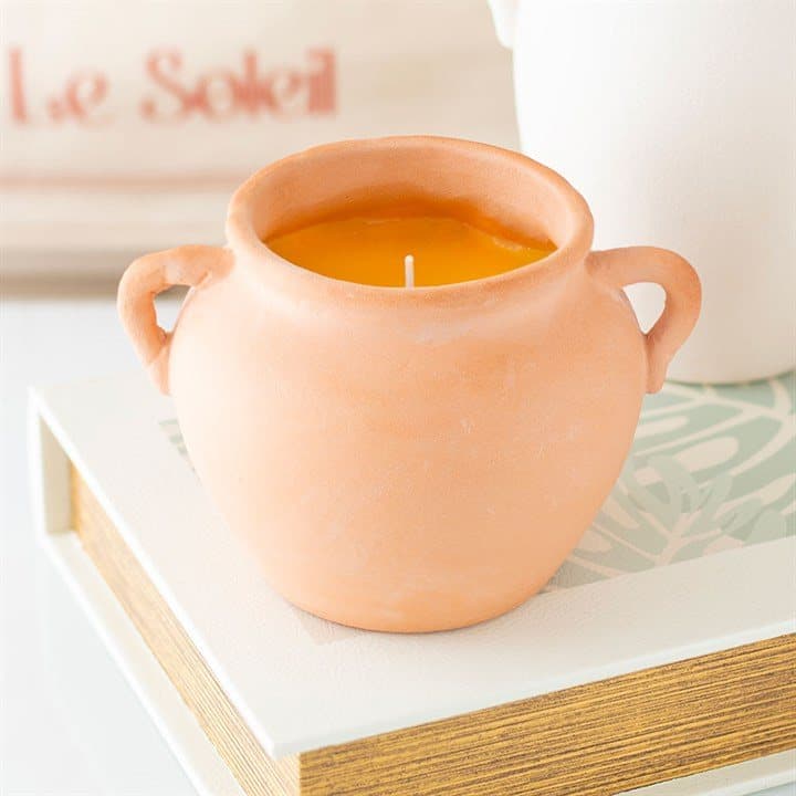 Terracotta urn candle with two artisan-style handles