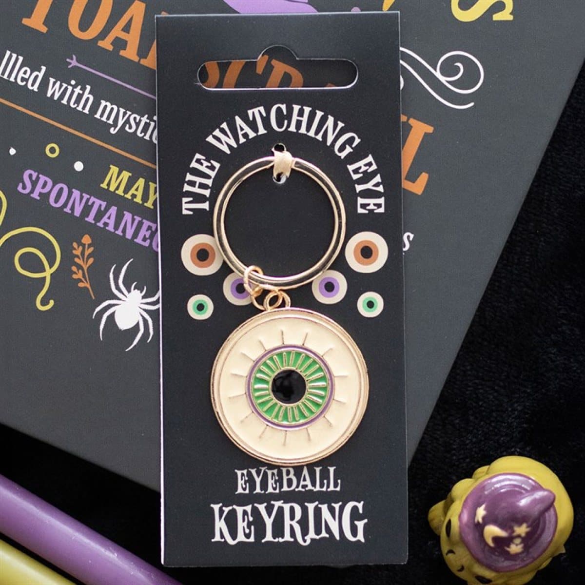 Gold-toned Watching Eye eyeball keyring with enamel design