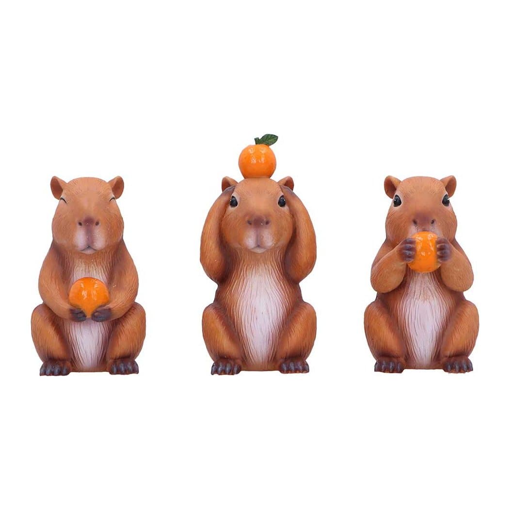 Three hand-painted resin capybara figurines, each holding an orange