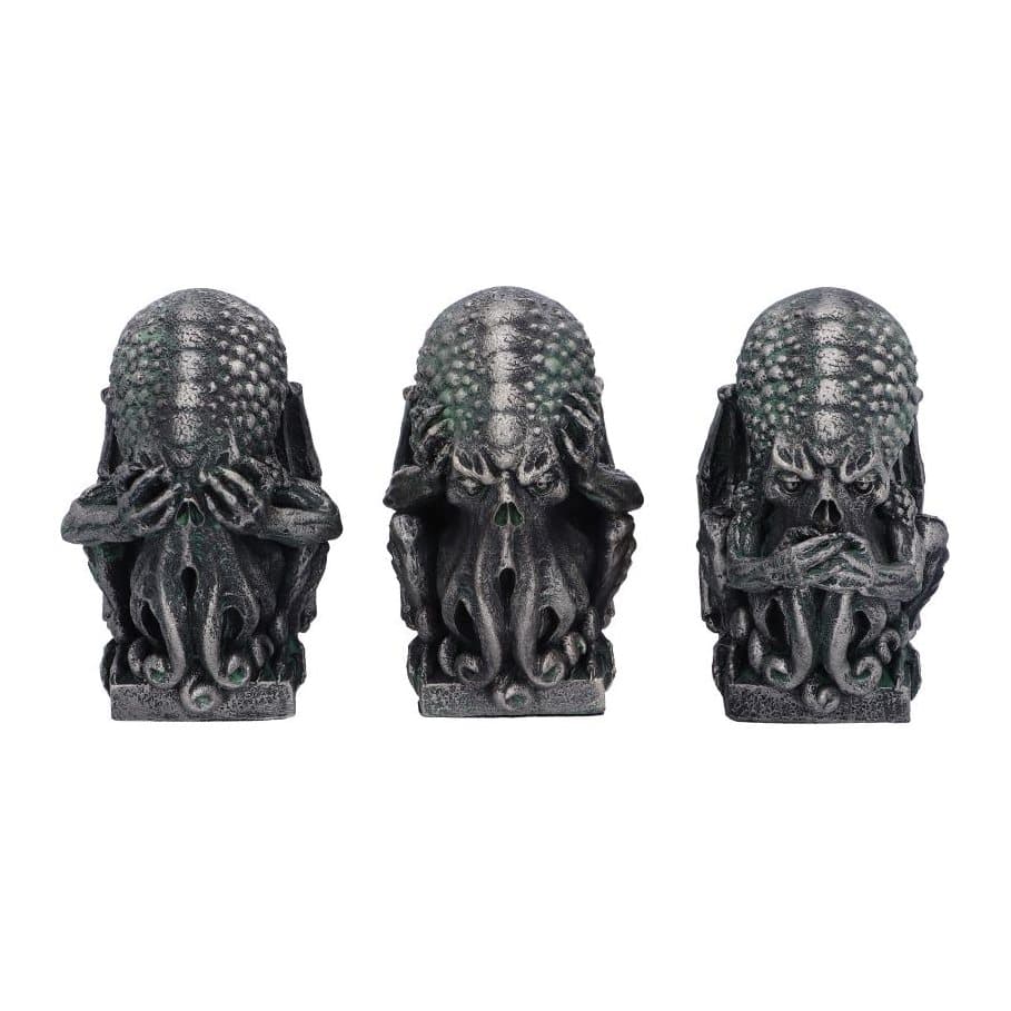 Three Cthulhu figurines sat clutching their knees, ears and mouth