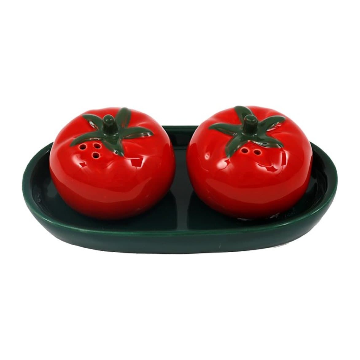 Red tomato salt and pepper shakers on a deep green tray