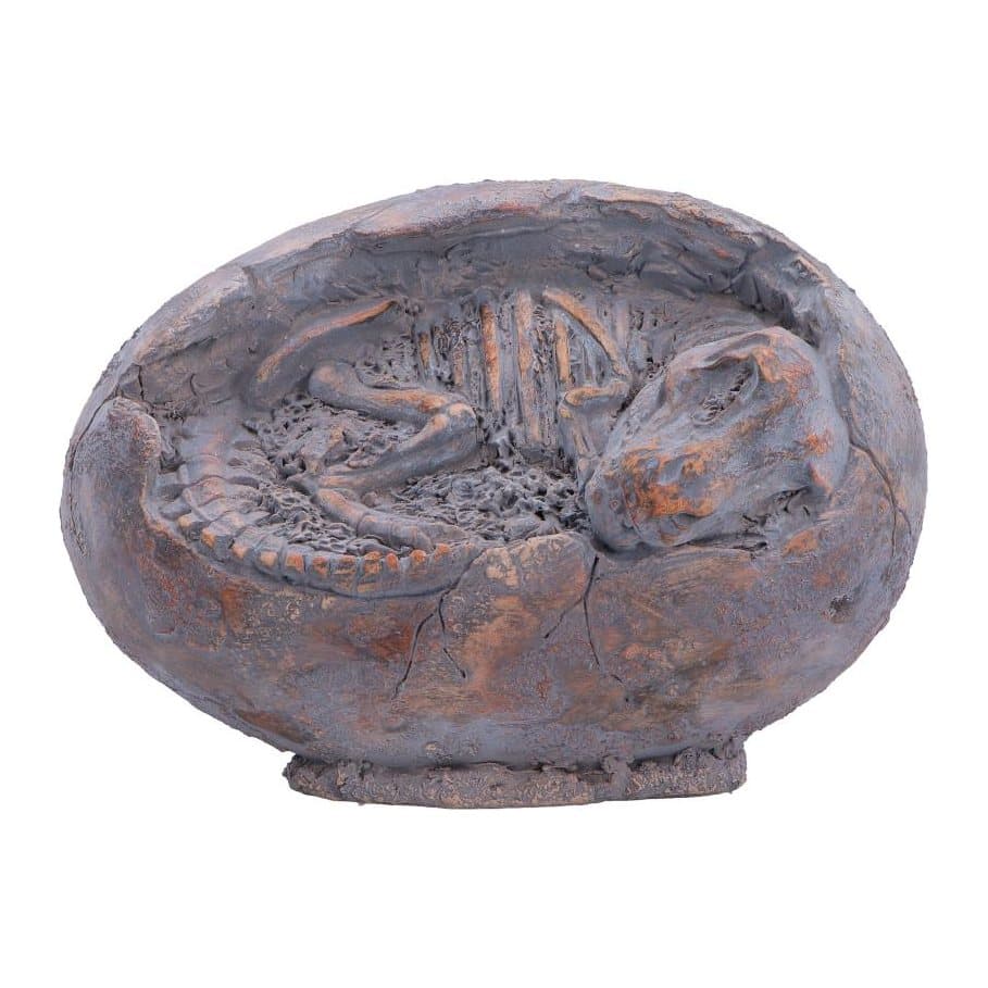 Cracked fossil-toned dinosaur egg figurine with a baby T. rex skeleton inside