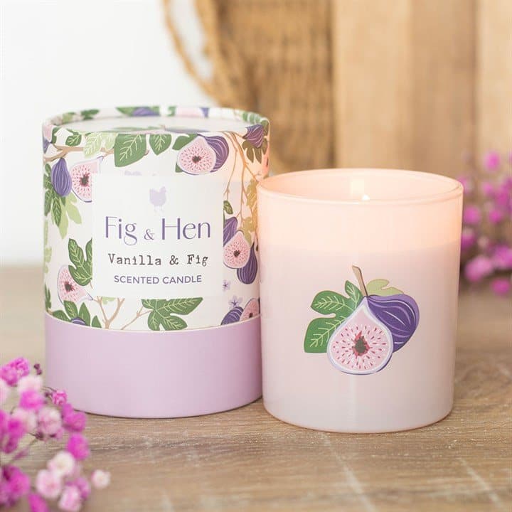 Soft pink glass jar candle with a fig illustration, in vanilla and fig scent