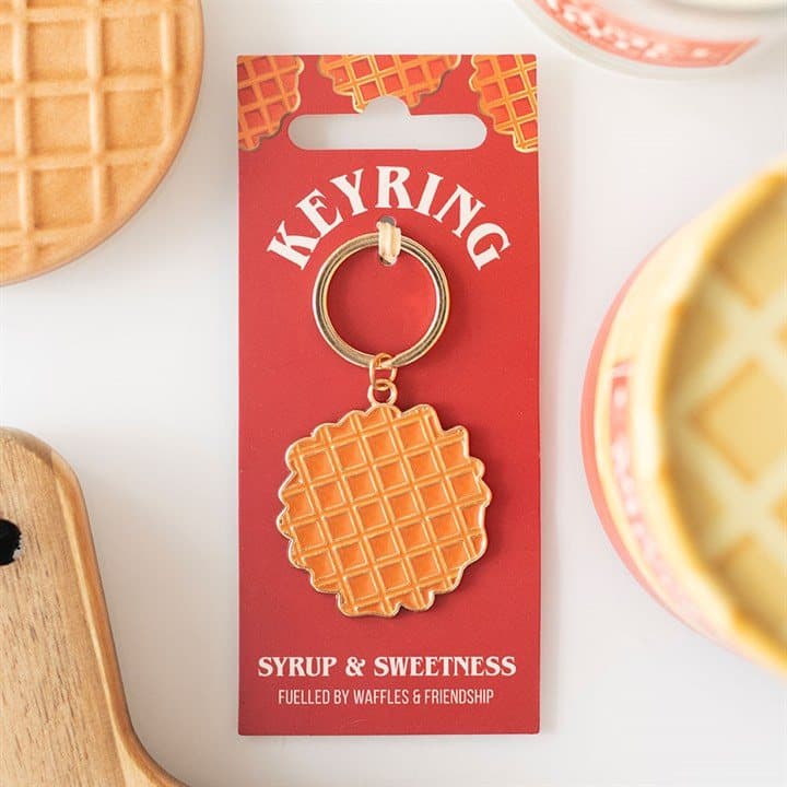 Waffle-shaped alloy keyring on a cardboard back with a Euro hook