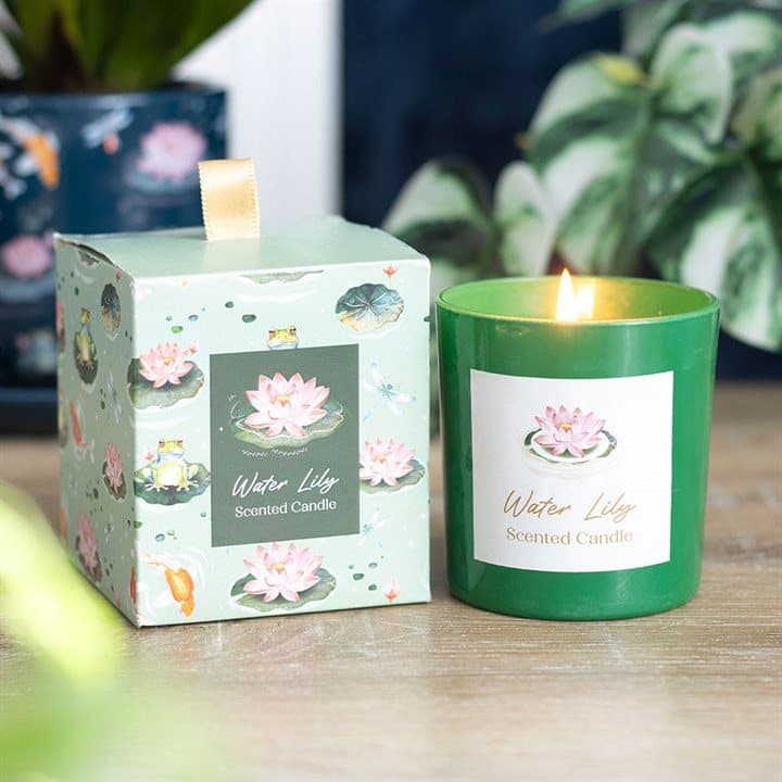 Water lily candle in green glass