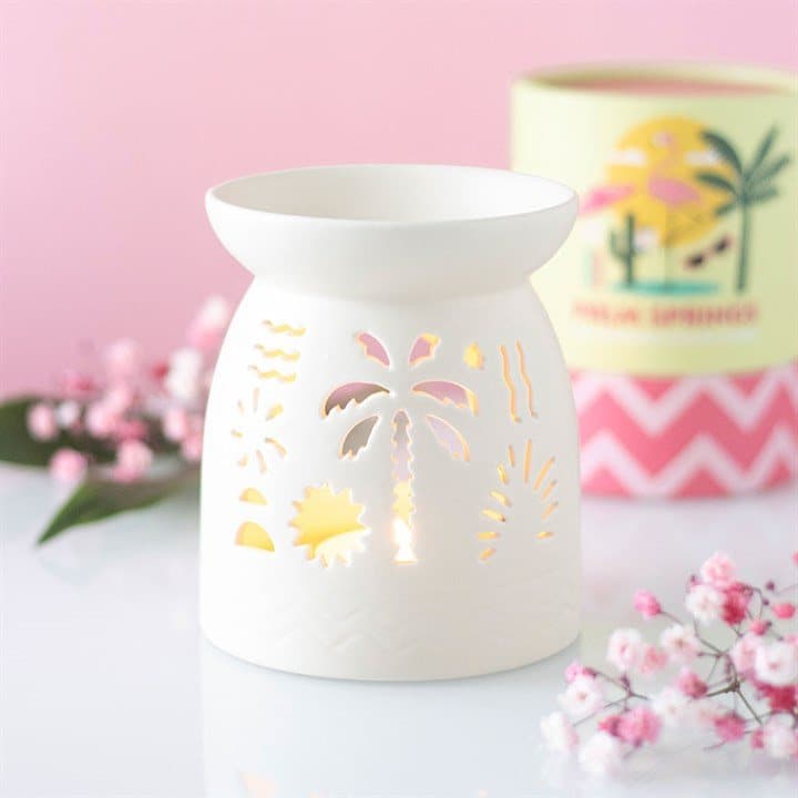 White beach oil burner with palm cut-outs