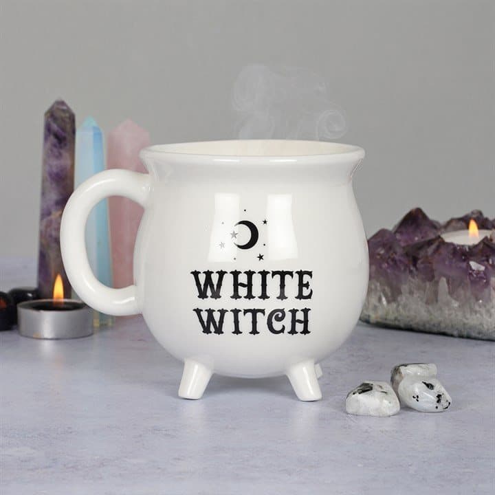 White cauldron-shaped mug with the words White Witch