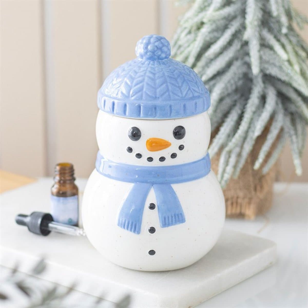 Blue ceramic snowman oil burner