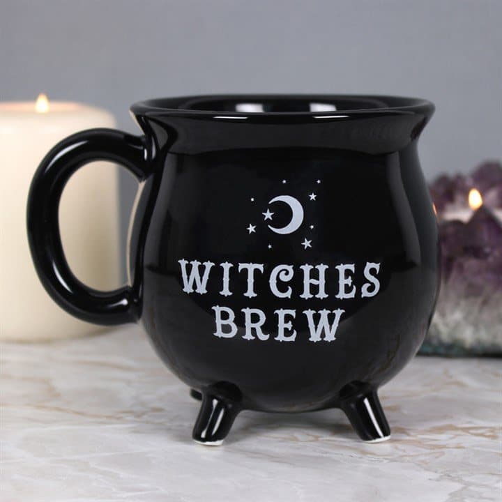 Black cauldron-shaped mug with the words Witches Brew
