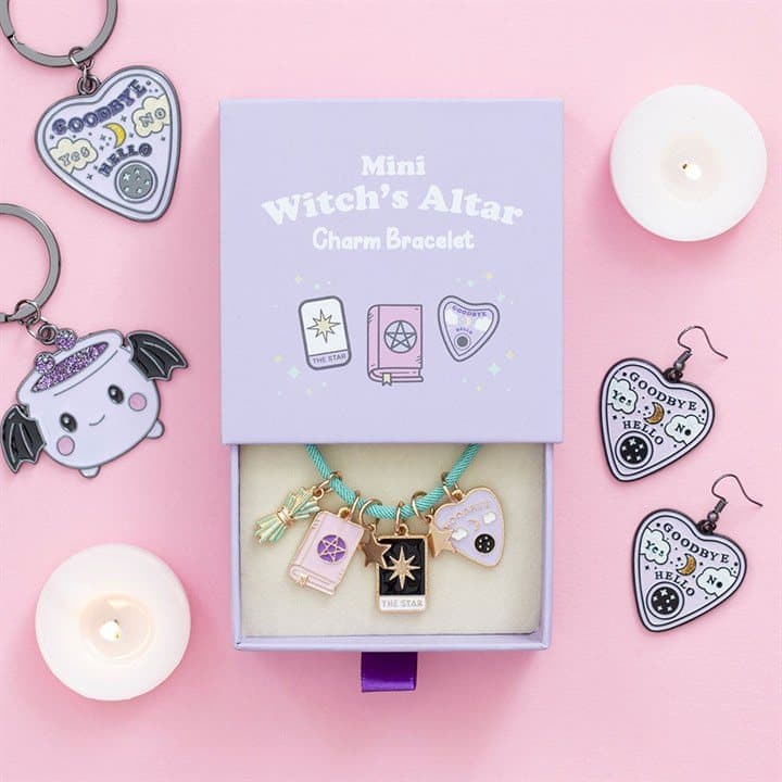 Cord bracelet with tiny enamel witch's altar charms