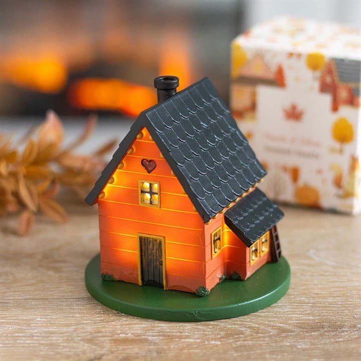 Brown light-up resin woodland house