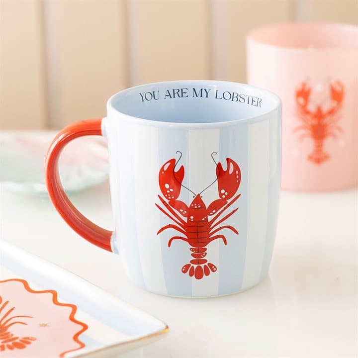 Blue and white striped mug with a red lobster