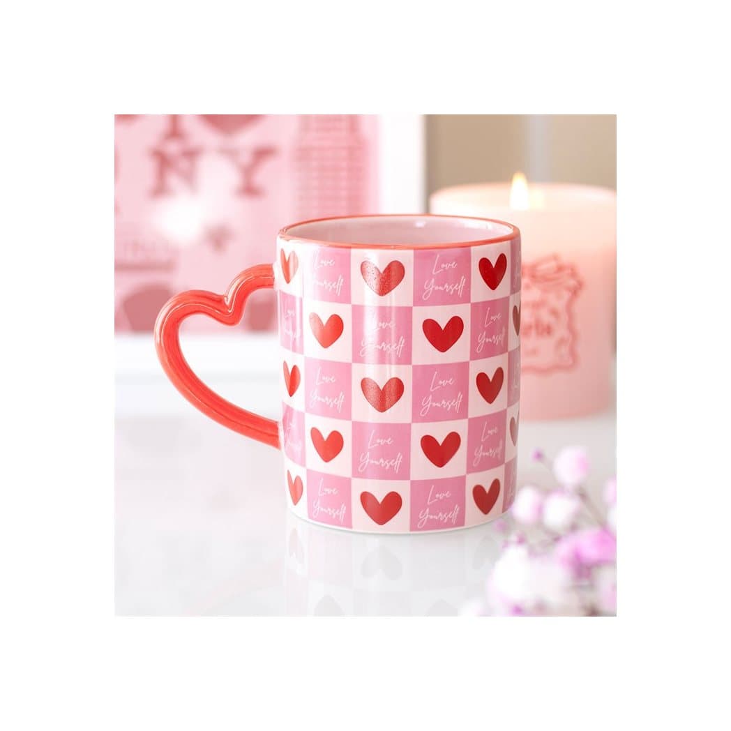 Checkered ceramic mug with a heart-shaped handle and a Love Yourself message