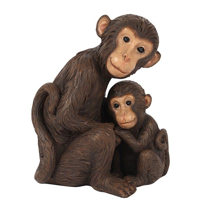 Resin monkey mother and baby ornament with the baby held close to the mother