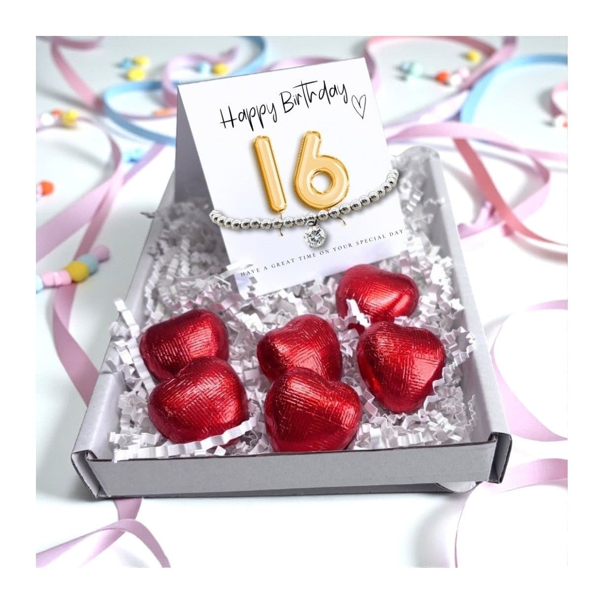 16th birthday gift box with cubic zirconia beaded bracelet and chocolate hearts