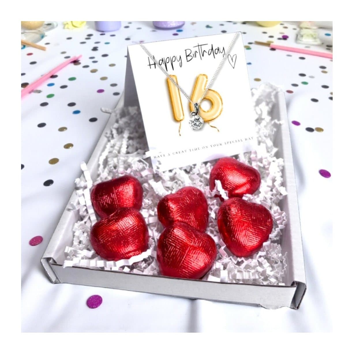 16th birthday necklace gift box with gold birthday balloons and chocolate hearts