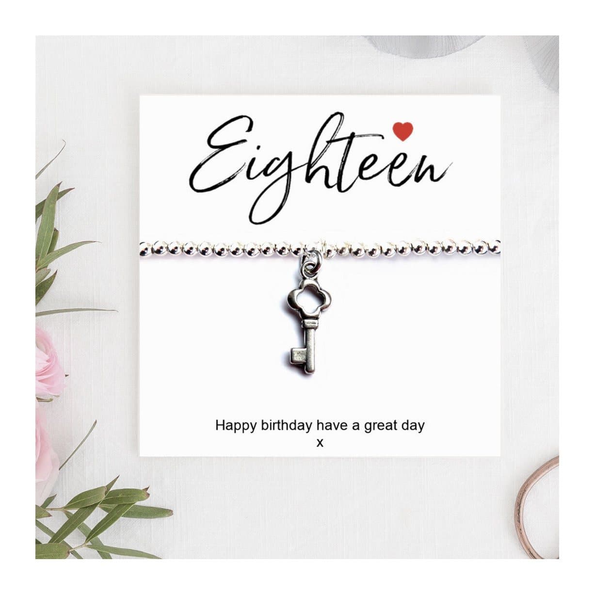 Silver beaded stretch bracelet with key charm and Eighteen Happy Birthday card