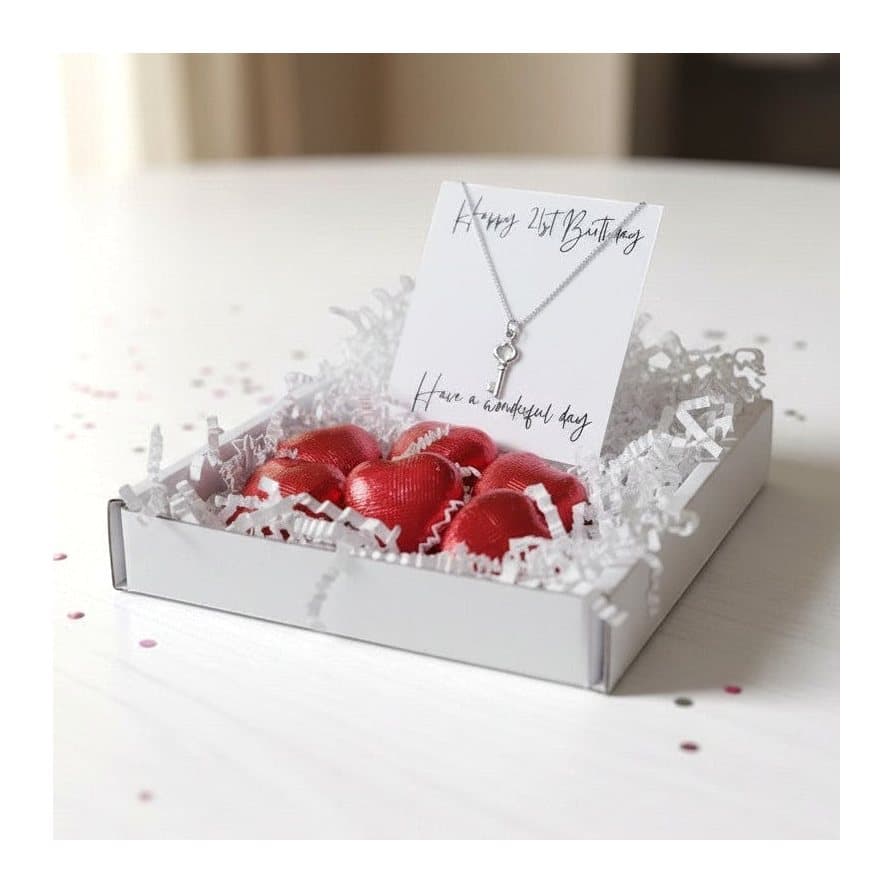 21st birthday key necklace in a gift box with six red foiled milk chocolate hearts