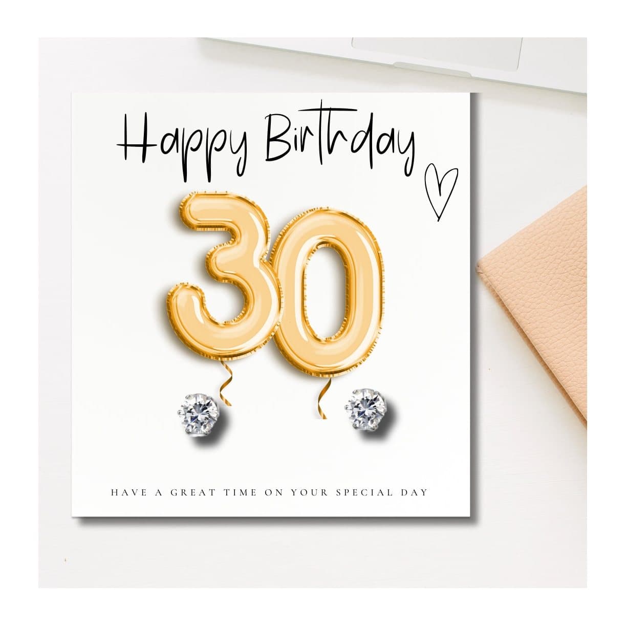 Silver cubic zirconia stud earrings with a 30th birthday gold balloons message card