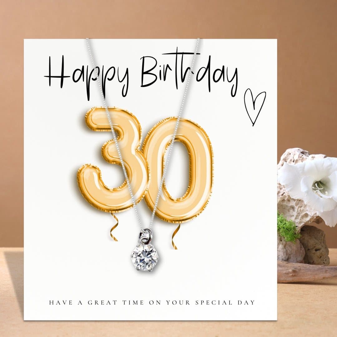 30th birthday necklace with a cubic zirconia charm and a gold balloons message card