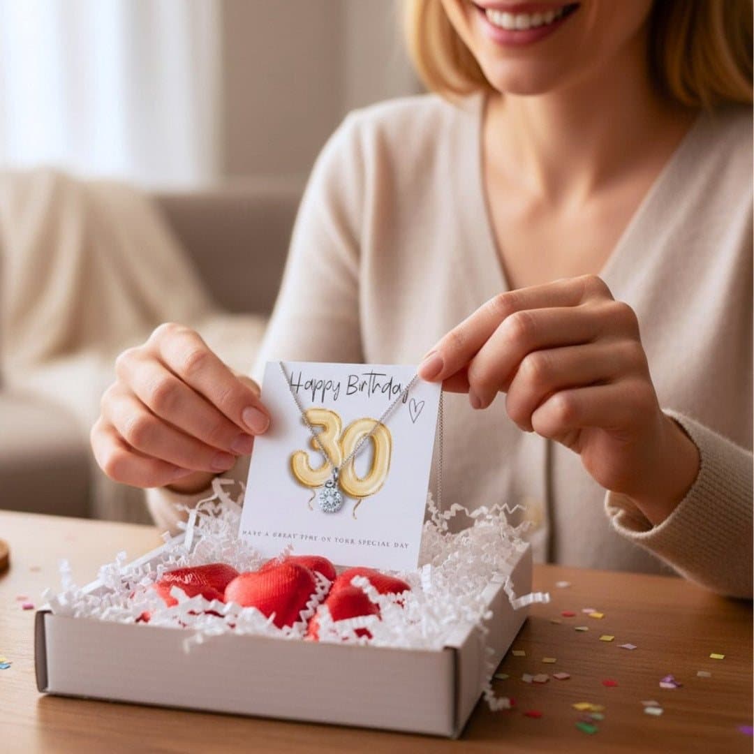 30th birthday gift box with silver necklace and red foiled chocolate hearts