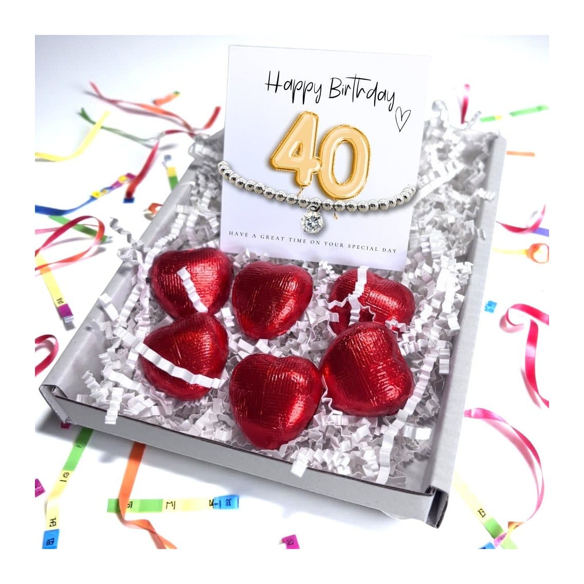 40th birthday gift box with a cubic zirconia bracelet and red foiled chocolate hearts