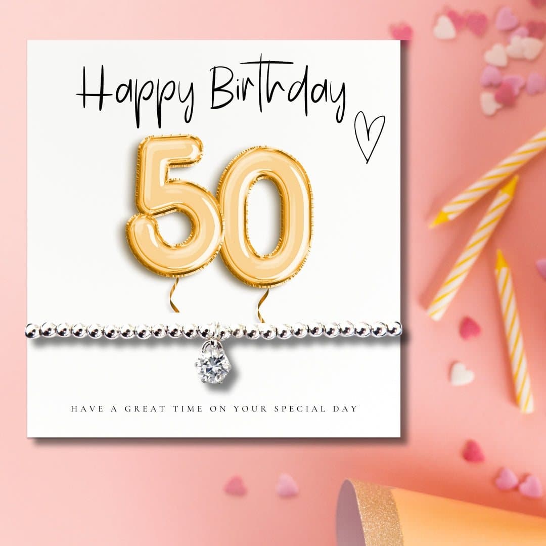 Silver stretch bracelet and gold balloons message card