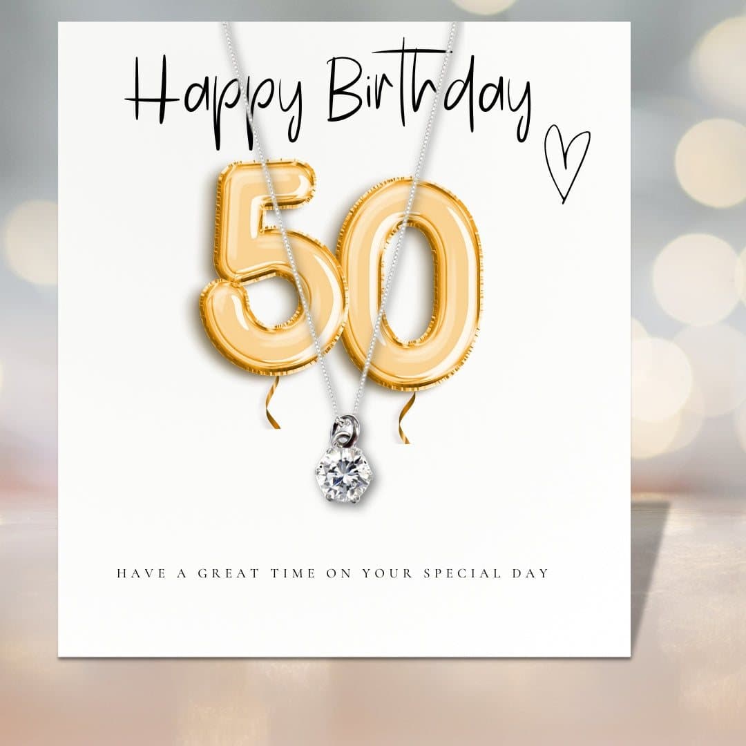 50th birthday necklace with a cubic zirconia charm and gold balloons message card