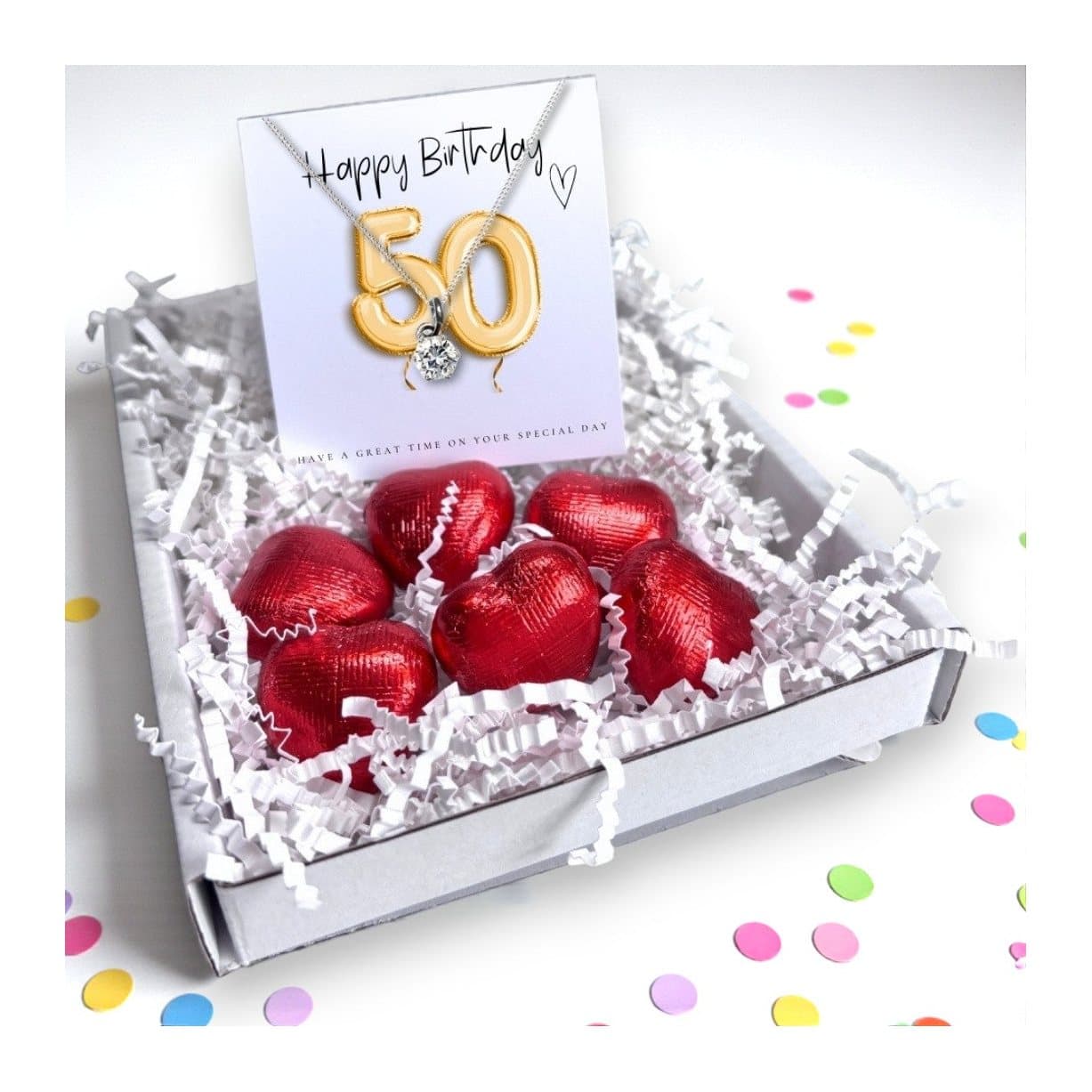 50th birthday gift box: silver cubic zirconia necklace and red foiled chocolate hearts