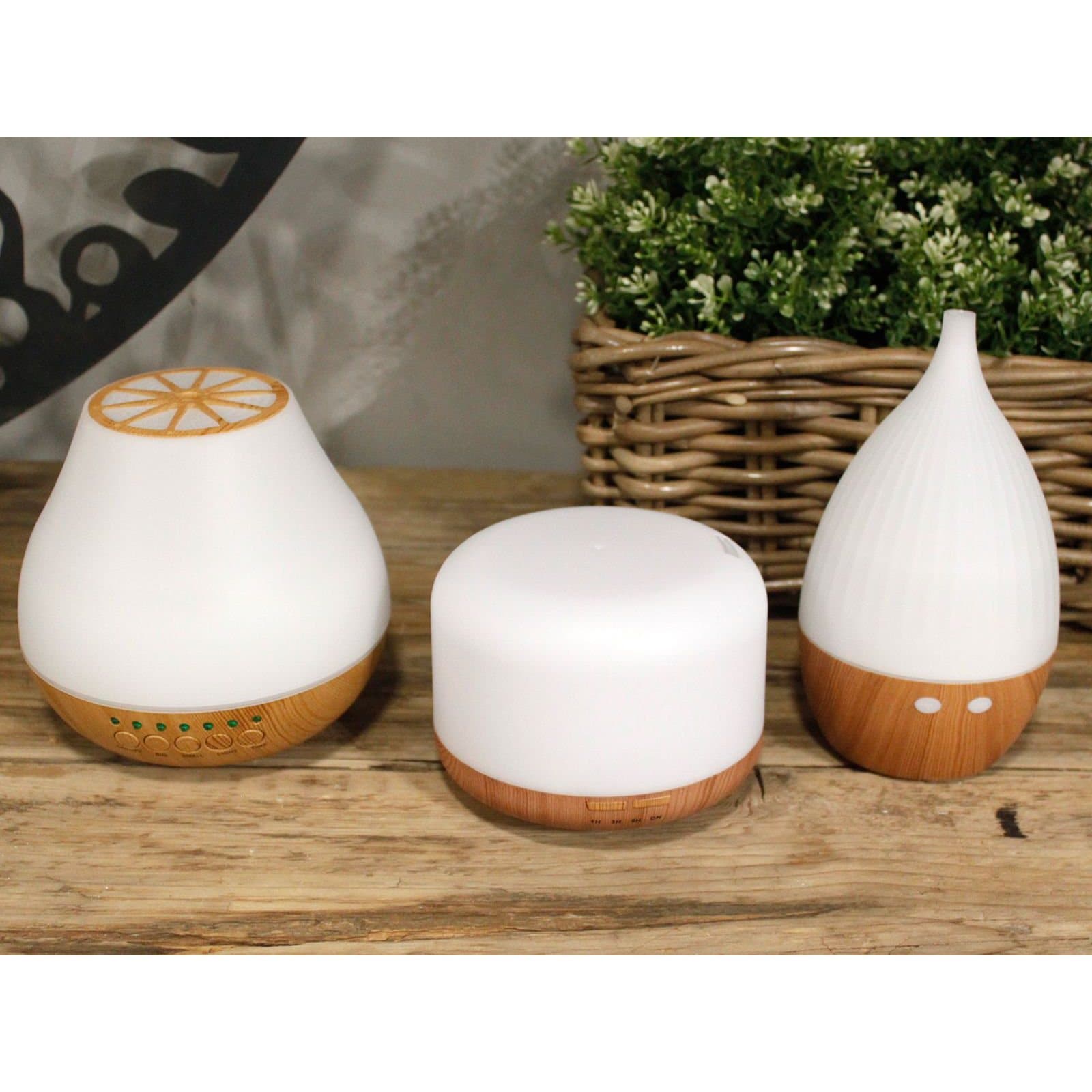 White pod-shaped aroma diffuser with a soft glow
