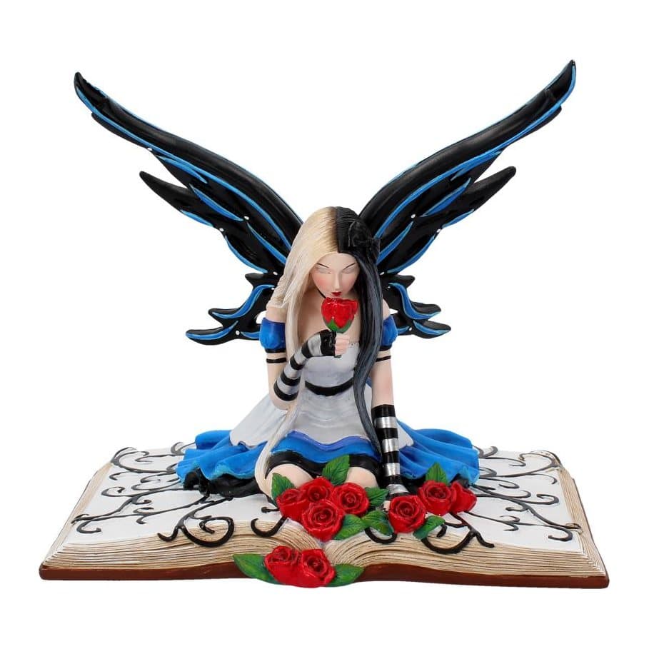 Alice fairy figurine kneeling in a book holding a rose, with black and blue wings