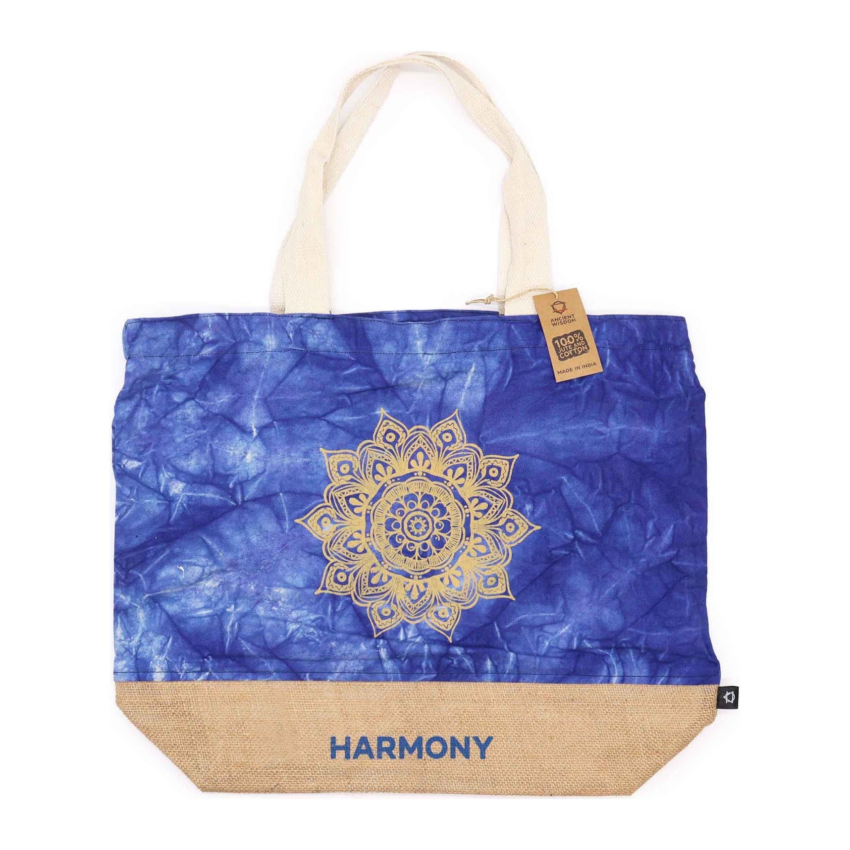 Blue stonewash tote bag with a Mandala design and the word Harmony on the front