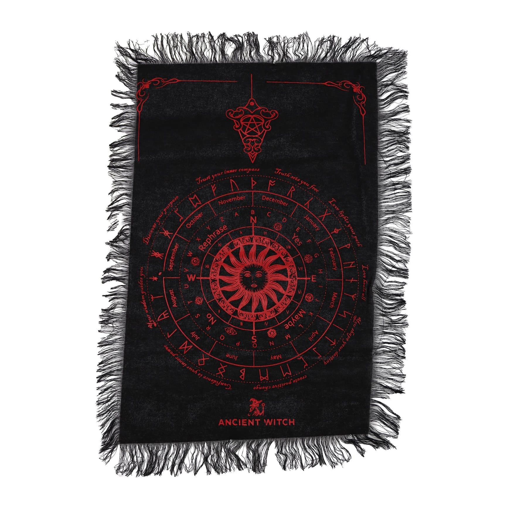 Black cloth with a red sun face design and soft fringe edges