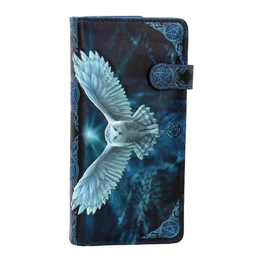 Snowy owl in full flight with a silver pentagram on an embossed purse