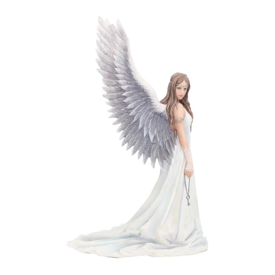 Chestnut-haired angel figurine with white wings holding an iron key