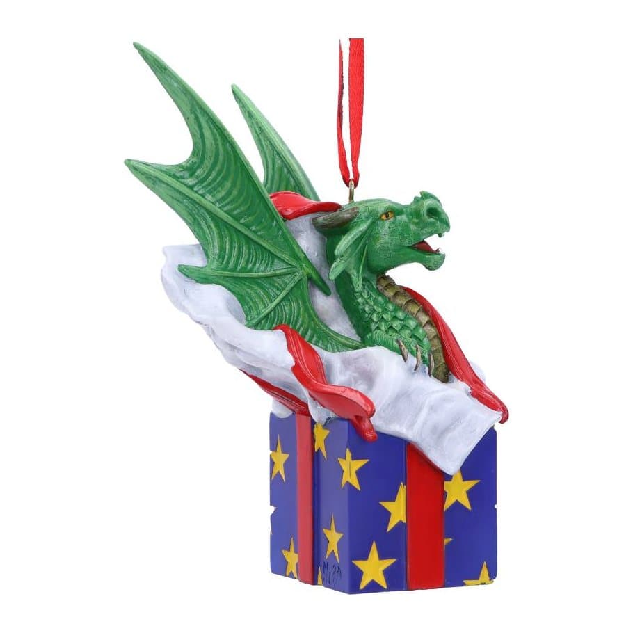 Green dragon hanging ornament with wings raised, sitting in a gift