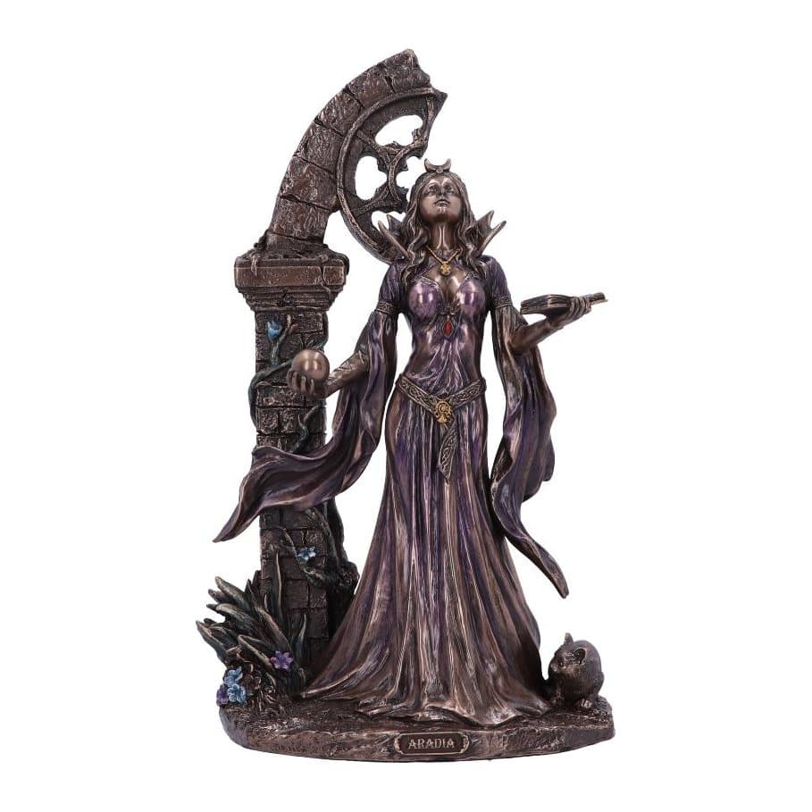Bronze-finish Aradia figurine with book, orb and cat before a stone arch