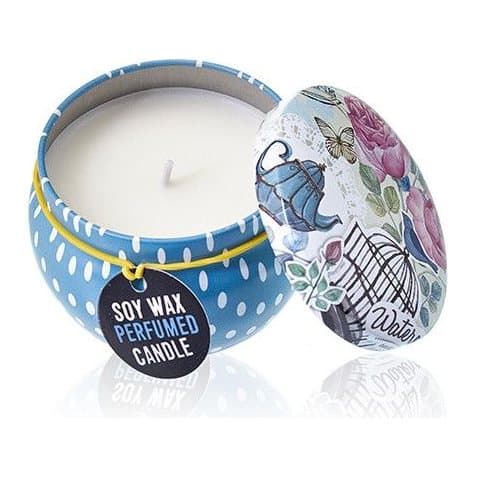 Two art printed tin candles in assorted designs