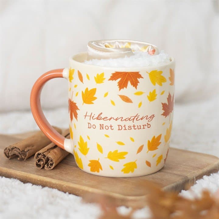 Autumn gift set with ceramic mug, fluffy socks and satin eye mask