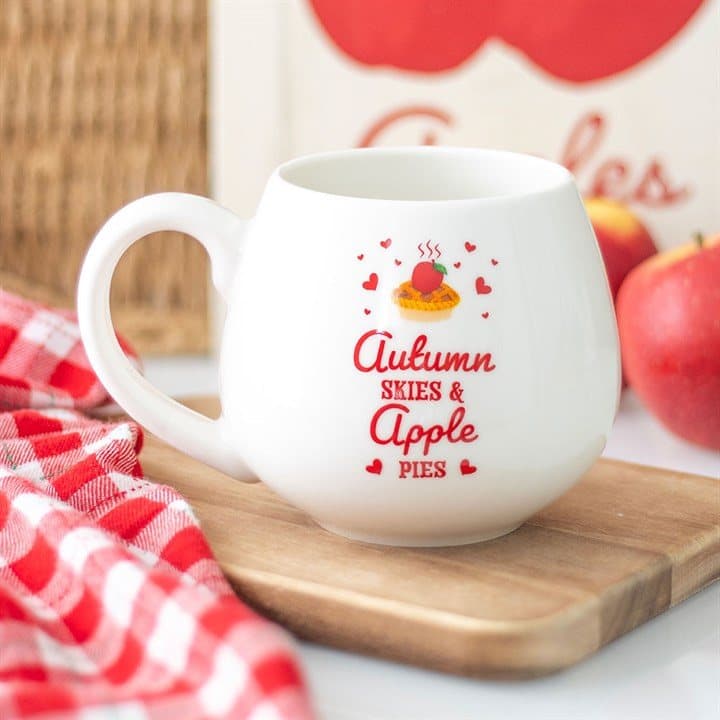 Rounded mug reading Autumn Skies and Apple Pies