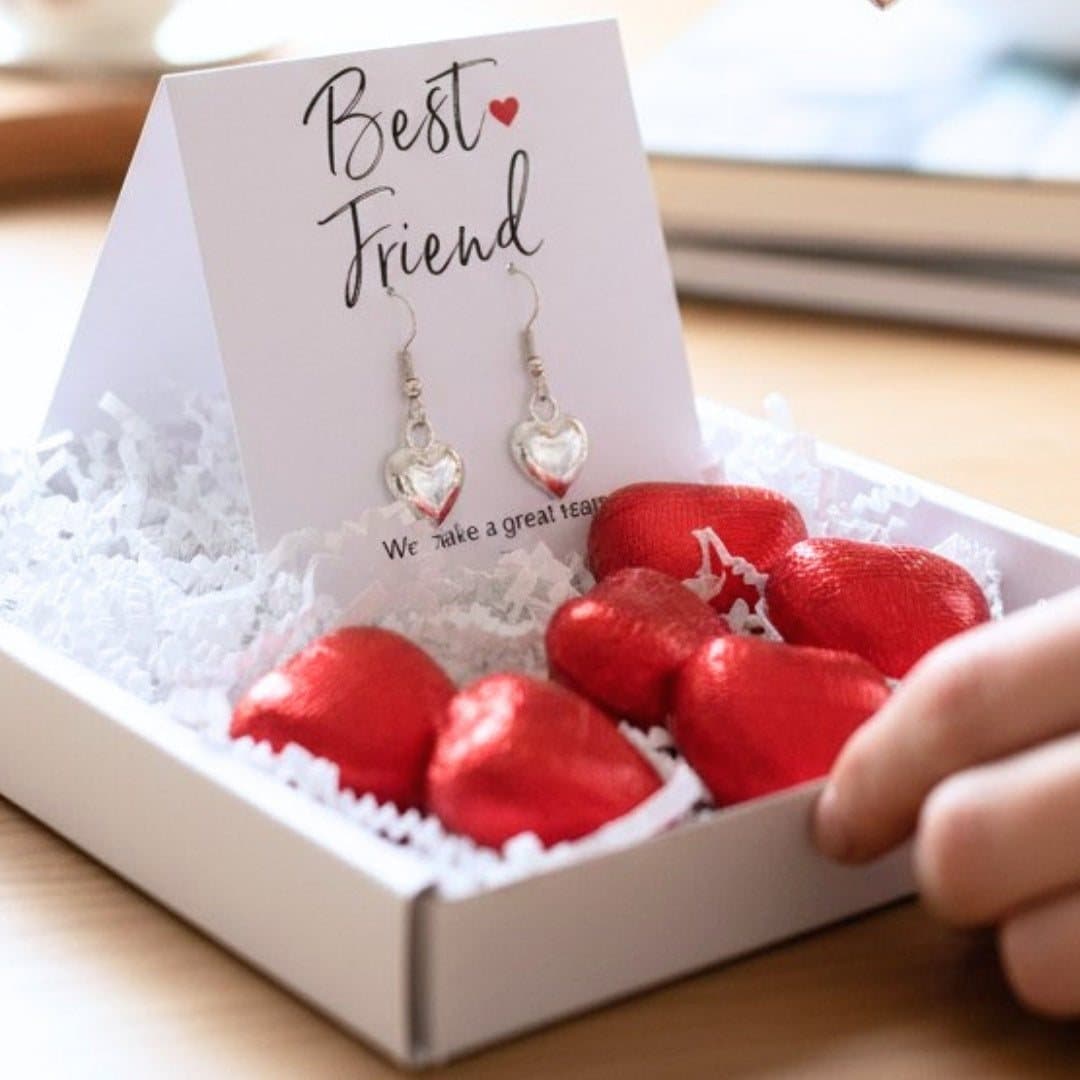 Mini gift hamper with silver heart earrings and red foiled chocolate hearts