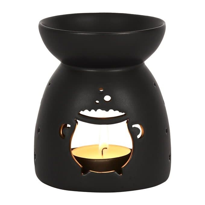 Black ceramic oil burner with a cutout cauldron design and matt finish