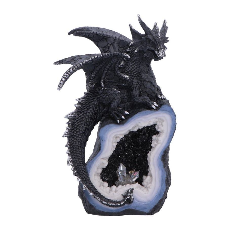Black dragon perched on a geode crystal figurine