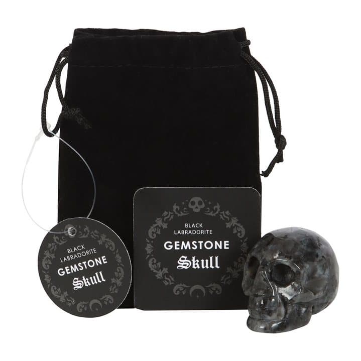 Black labradorite crystal skull with a black drawstring pouch