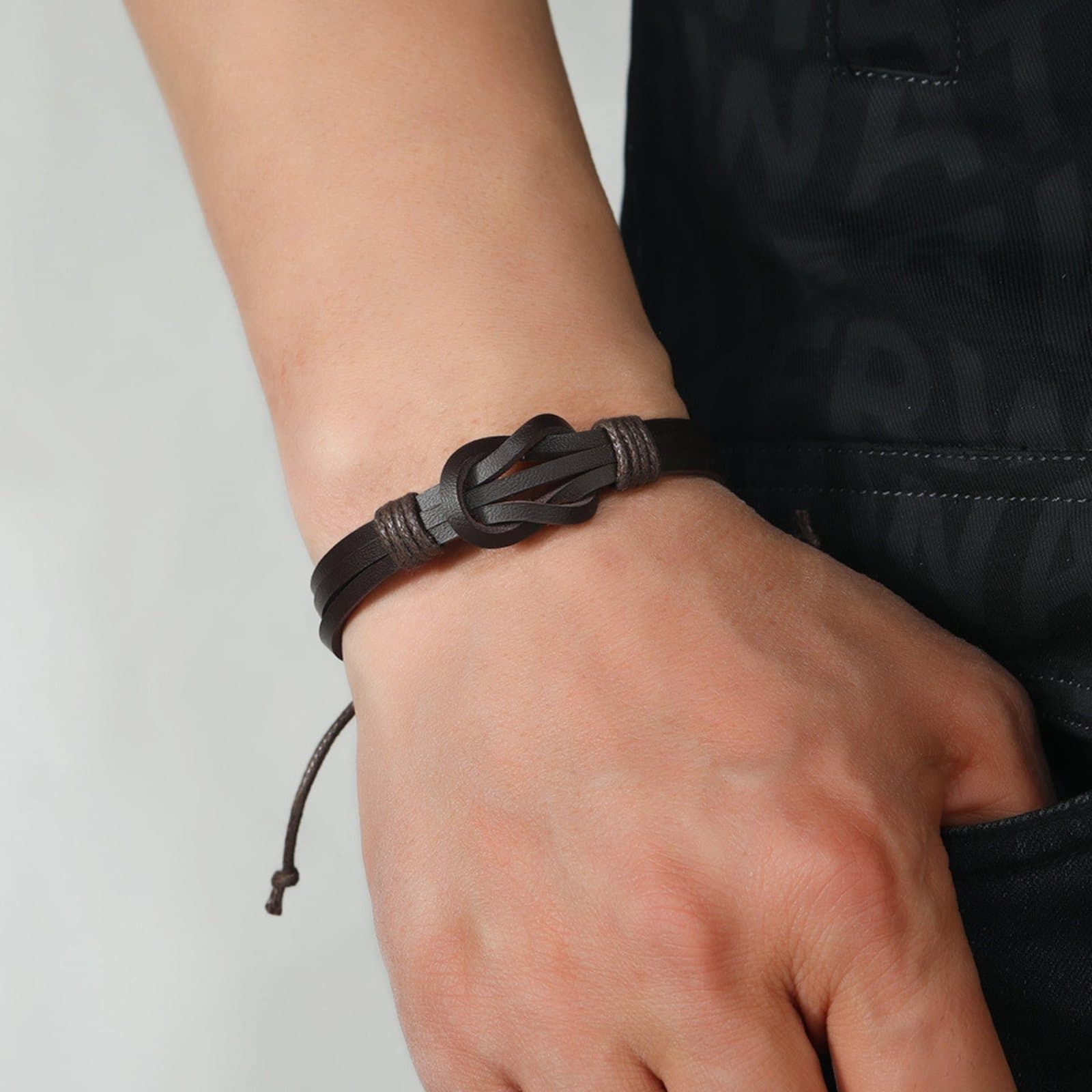 Black leather retro knot bracelet with an adjustable wax rope